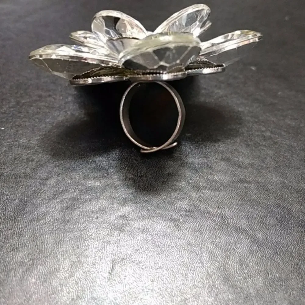 Silver tone sparkly flower bling ring